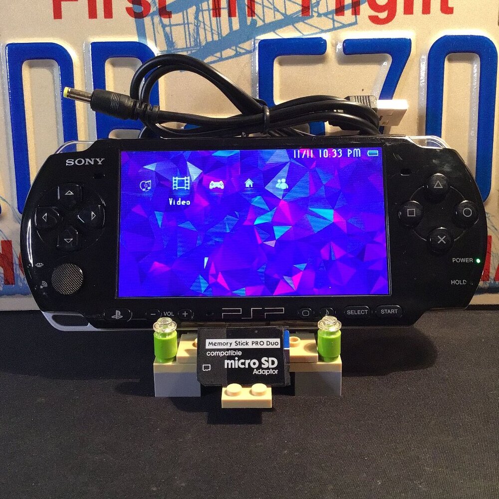 Sony PSP 3001 with Charger, Memory Stick, & Games